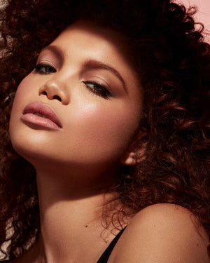 Cheeks Out Freestyle Cream Blush medium model shown in shade Petal Poppin