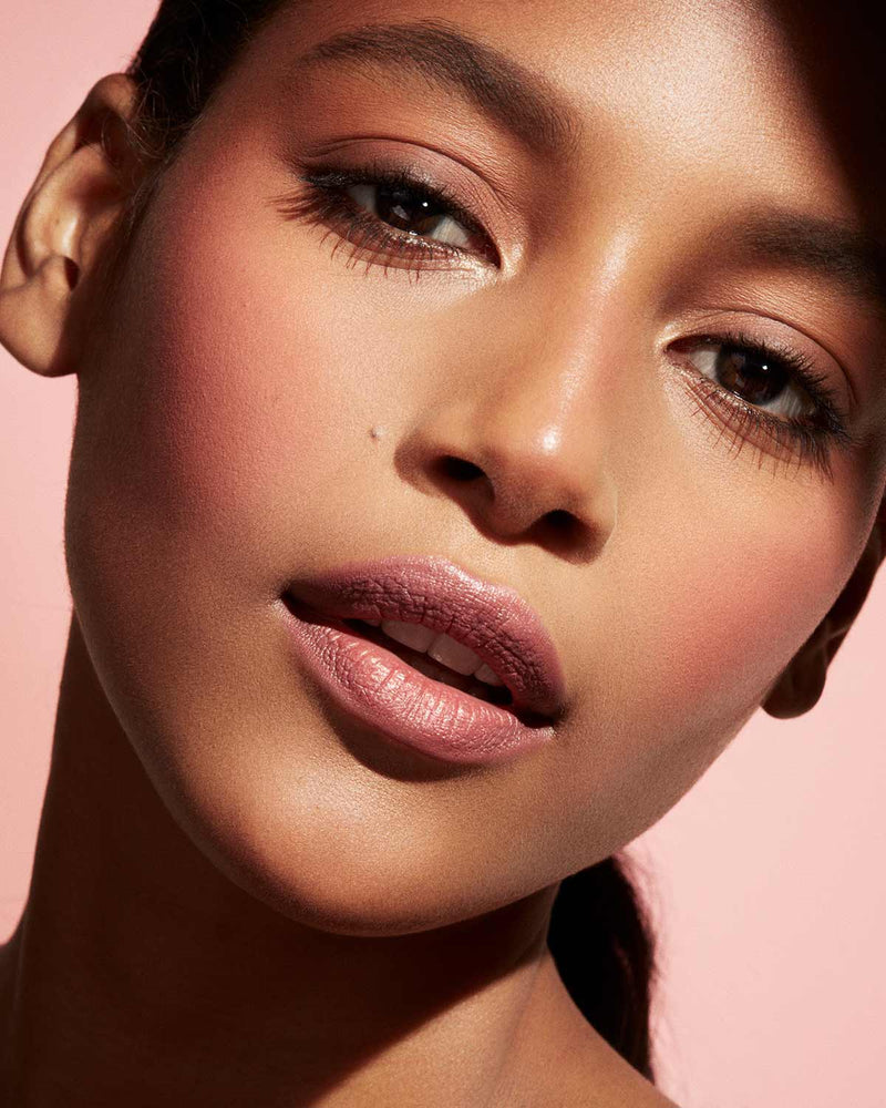 Cheeks Out Freestyle Cream Blush tan model shown in shade Petal Poppin