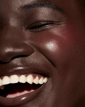 Cheeks Out Freestyle Cream Blush close up deep model shown in shade Daiquiri Dip