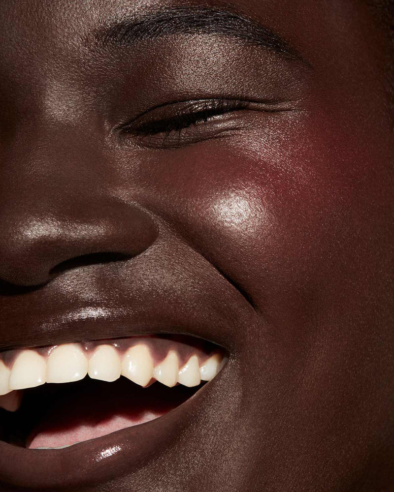 Cheeks Out Freestyle Cream Blush close up deep model shown in shade Daiquiri Dip