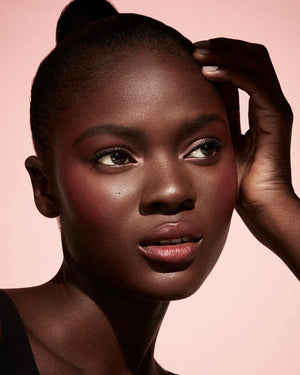 Cheeks Out Freestyle Cream Blush deep model shown in shade Daiquiri Dip