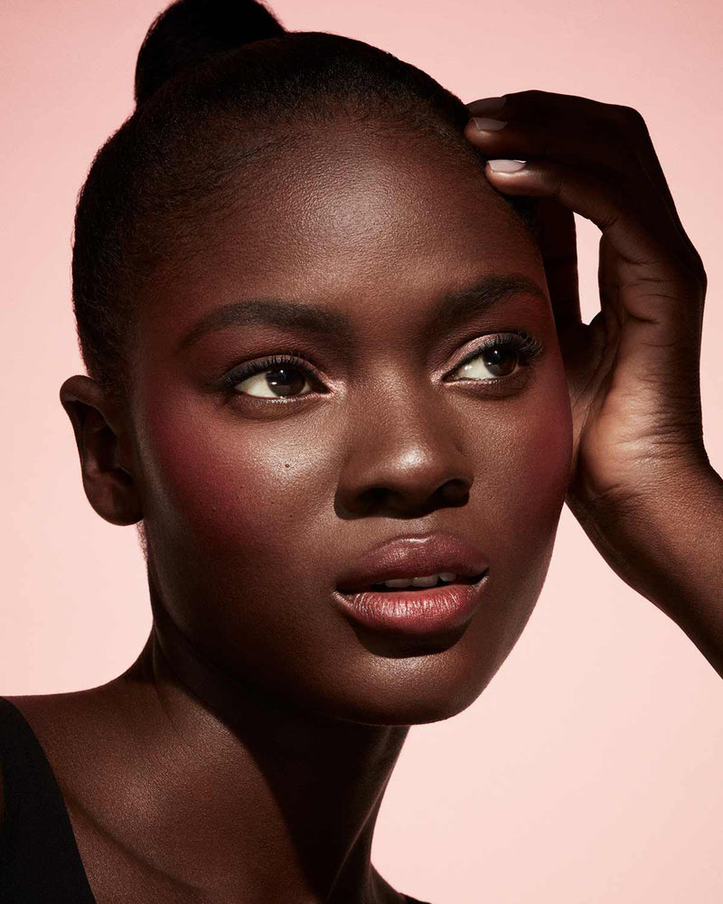 Cheeks Out Freestyle Cream Blush deep model shown in shade Daiquiri Dip