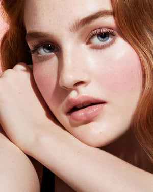 Cheeks Out Freestyle Cream Blush light model shown in shade Drama Cla$$