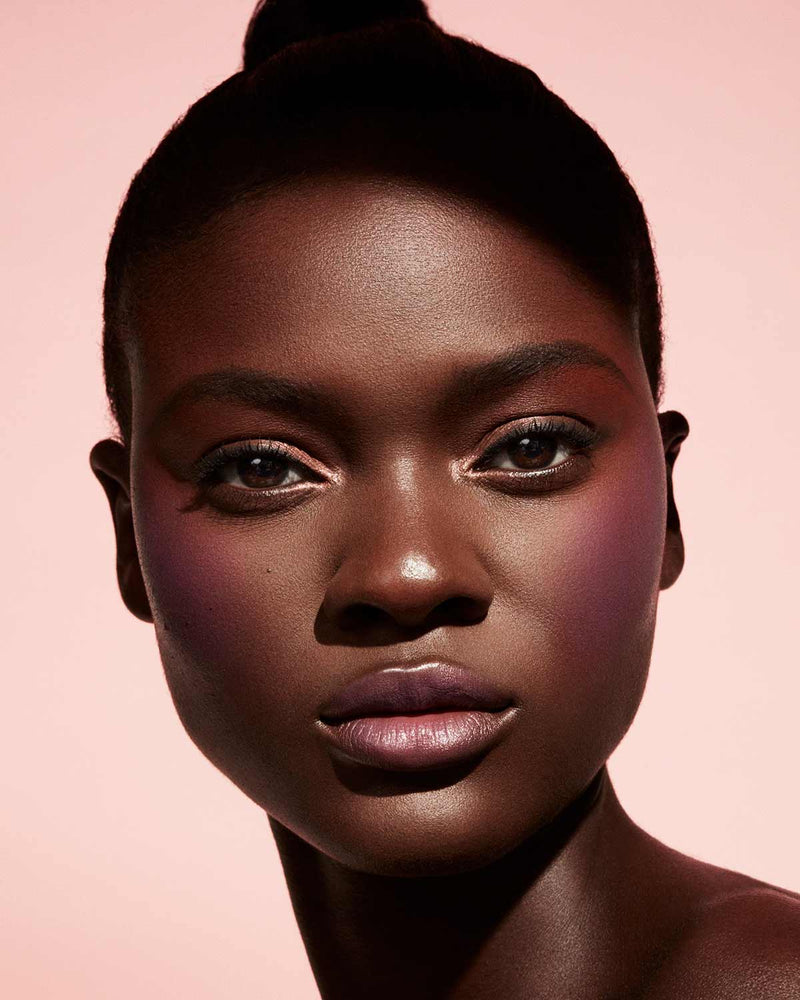 Cheeks Out Freestyle Cream Blush deep model shown in shade Drama Cla$$