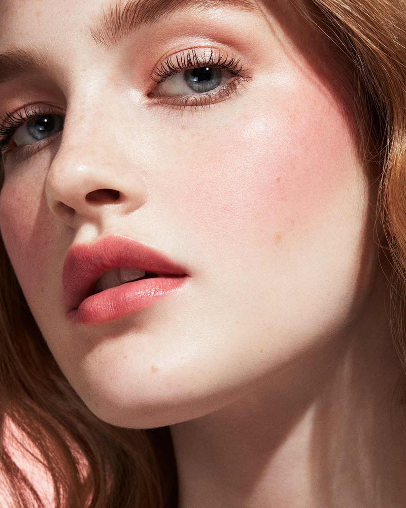 Cheeks Out Freestyle Cream Blush light model shown in shade Summertime Wine
