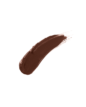 A smear of Match Stix Contour Skinstick in the shade Ebony on a white background.