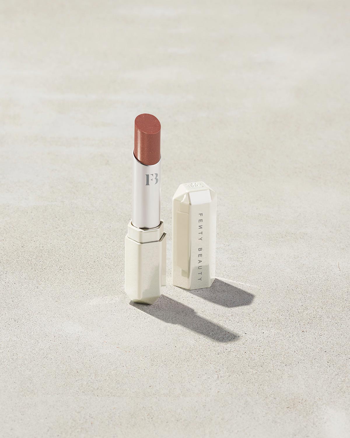 Slip Shine Sheer Shiny Lipstick shown in shade Bubblerum