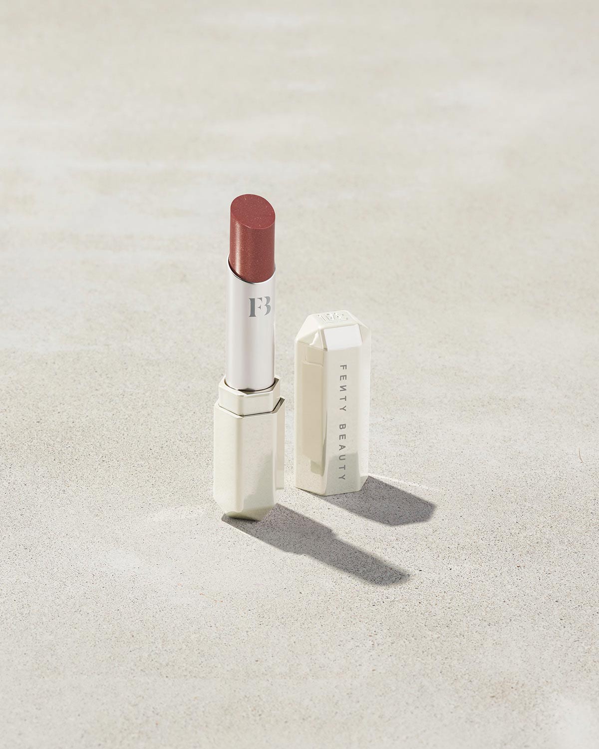 Slip Shine Sheer Shiny Lipstick shown in shade Cookies & Cocoa