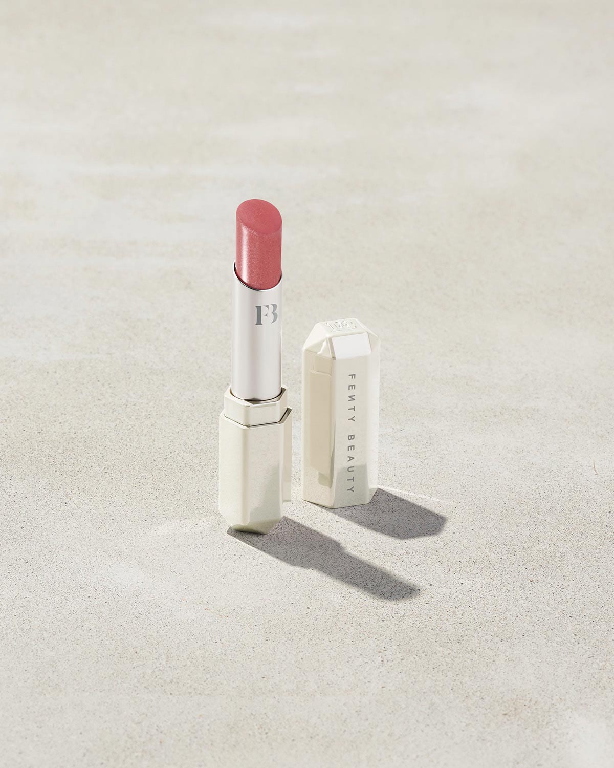 Slip Shine Sheer Shiny Lipstick shown in shade Retro Rose