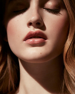 Slip Shine Sheer Shiny Lipstick light model shown in shade Retro Rose
