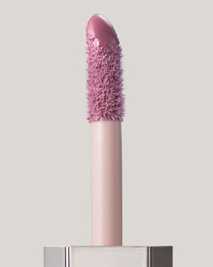 Gloss Bomb Cream applicator shown in shade Mauve Wive$