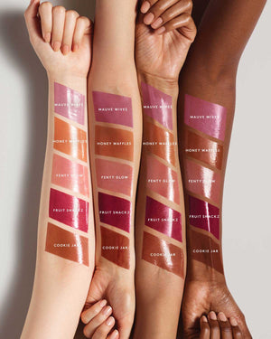 all Fenty Beauty Gloss Bomb Cream Color Drip Lip Cream lip gloss shades swatched on a variety of skin tones