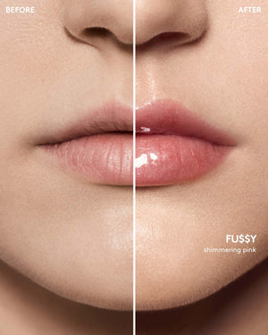 before and after of light skin toned model wearing gloss bomb universal lip luminizer in shade Fu$$y