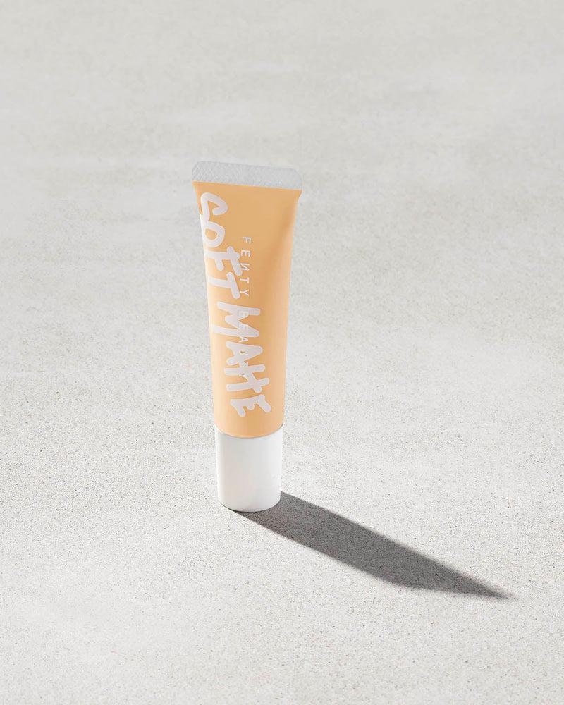 tube of Pro Filt'r Mini Soft Matte Longwear Foundation — #200 on concrete background