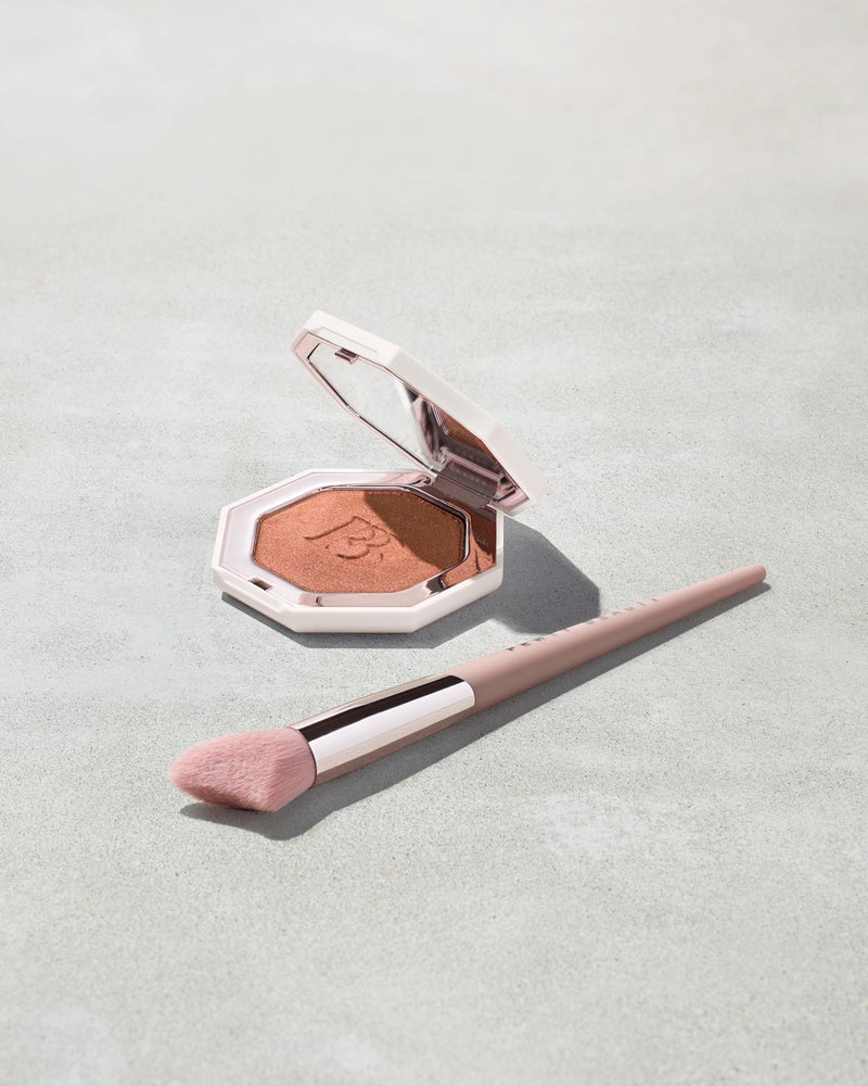 Killawatt Foil Freestyle Highlighter shown in shade Penny 4UThots with Cheek Hugging Highlight Brush