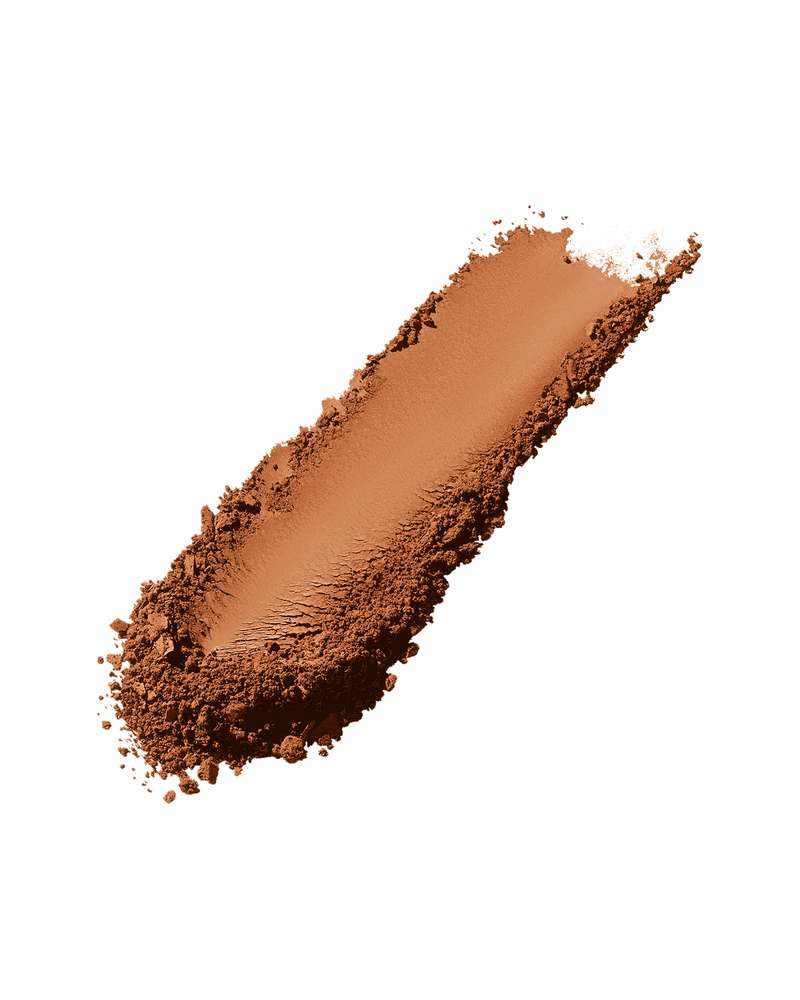 Sun Stalk'r Instant Warmth Bronzer smear shown in shade Coco Naughty