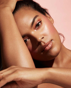 Cheeks Out Freestyle Cream Blush mdeium model shown in shade Strawberry Drip