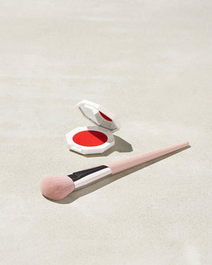 Cheeks Out Freestyle Cream Blush shown in shade Daiquiri Dip with Face Shaping Brush 125