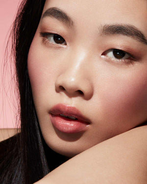Cheeks Out Freestyle Cream Blush light model shown in shade Cool Berry