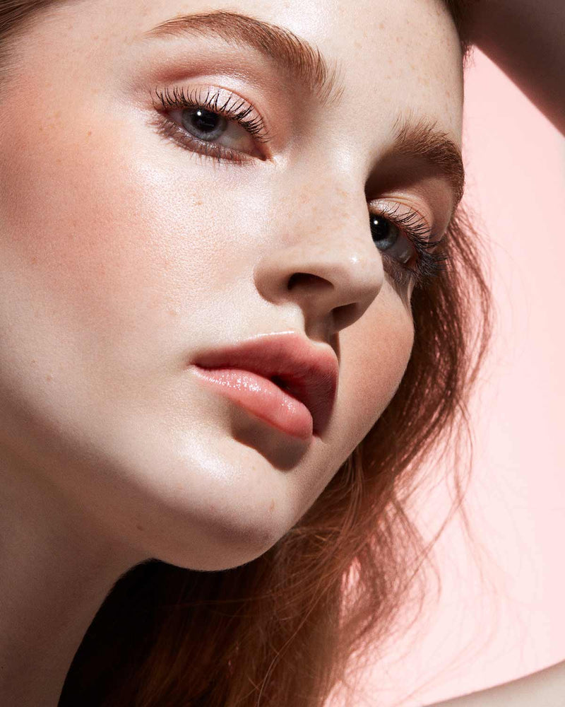 Cheeks Out Freestyle Cream Blush light model shown in shade Rose Latte