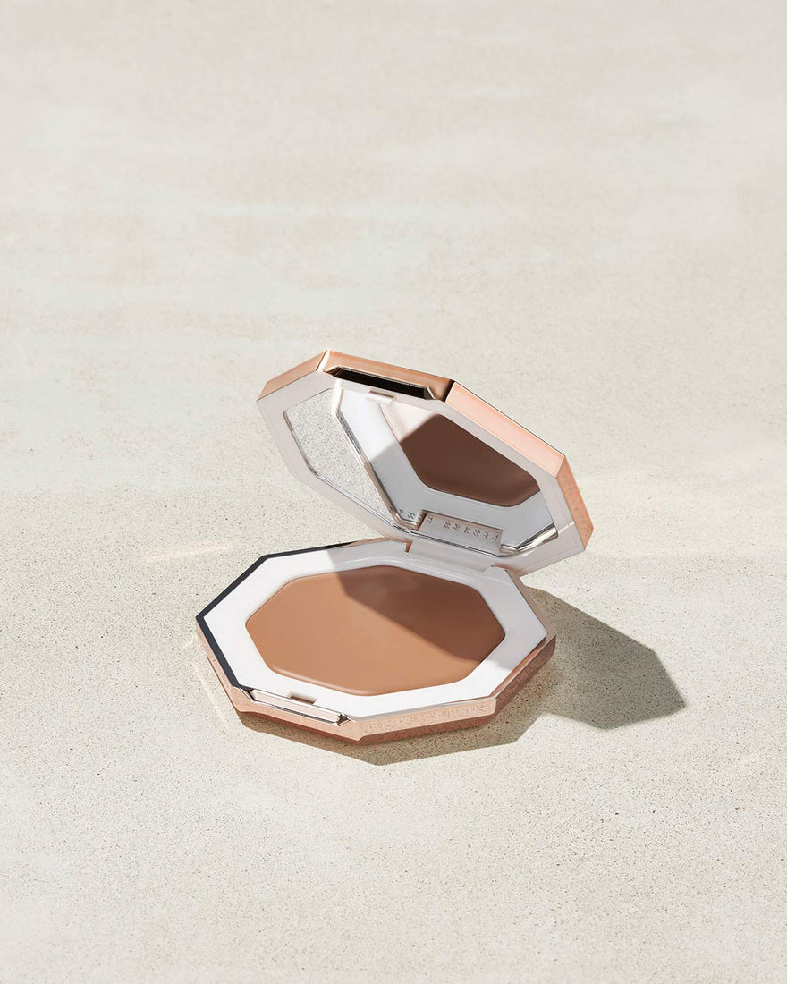 Cheeks Out Freestyle Cream Bronzer shown in shade Butta Biscuit