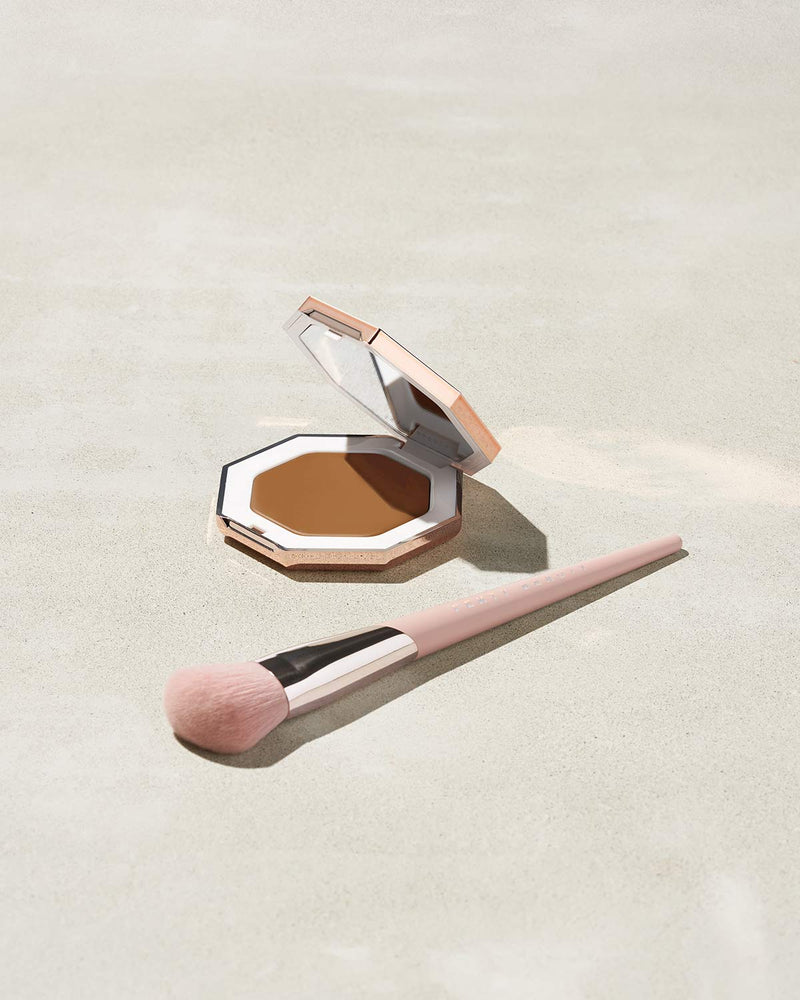 Cheeks Out Freestyle Cream Bronzer shown in shade Teddy with Face Shaping Brush 125