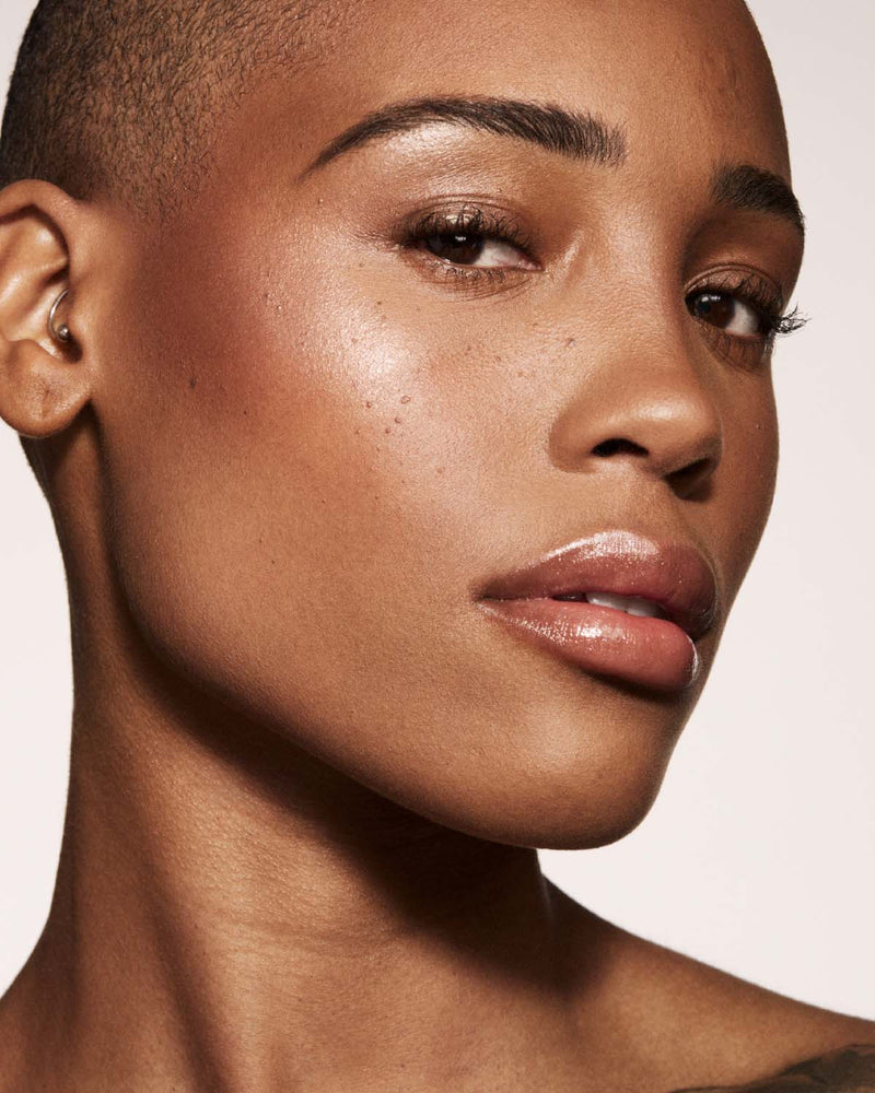 model imagery of killawatt in shades afternoon snack and more honey on medium deep skin tone