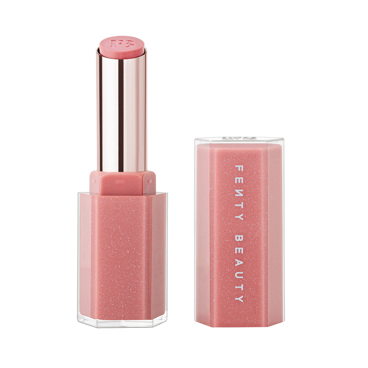 Open product shot of Gloss Bomb Stix Shimmer in shade Fussy on a concrete background.