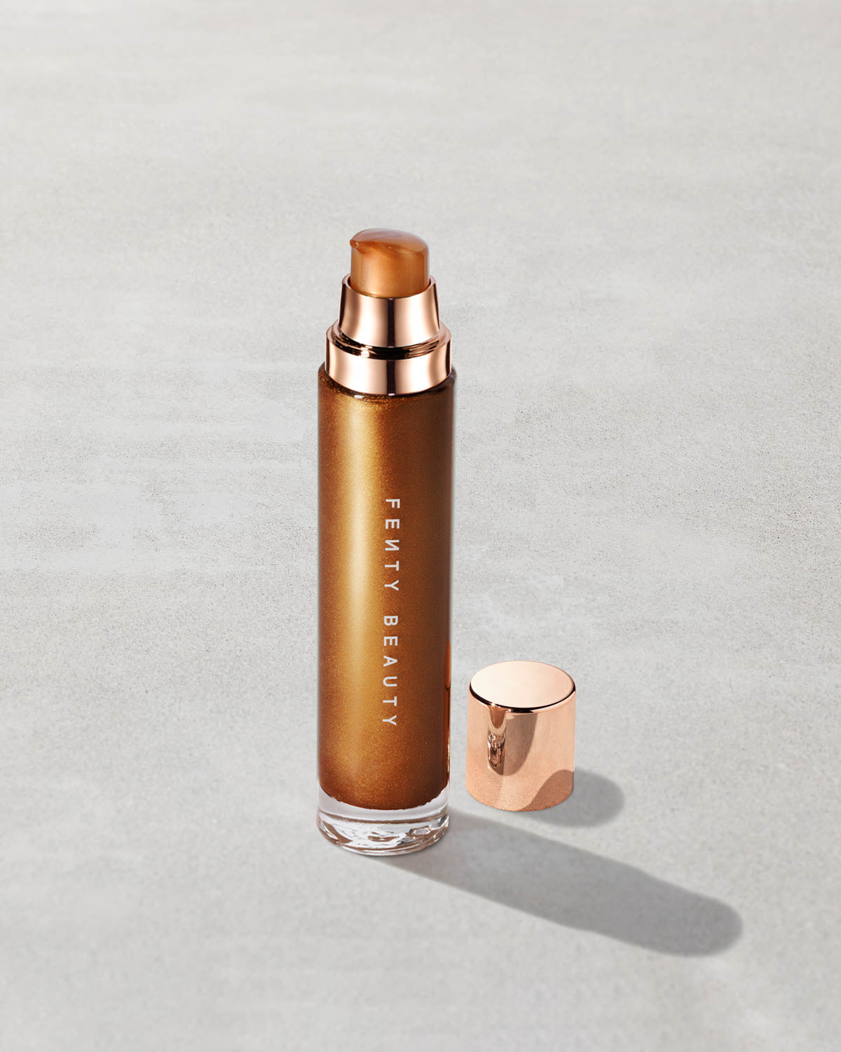 Open product shot of Body Lava Body Luminizer in shade 'Hold my Trophy'.
