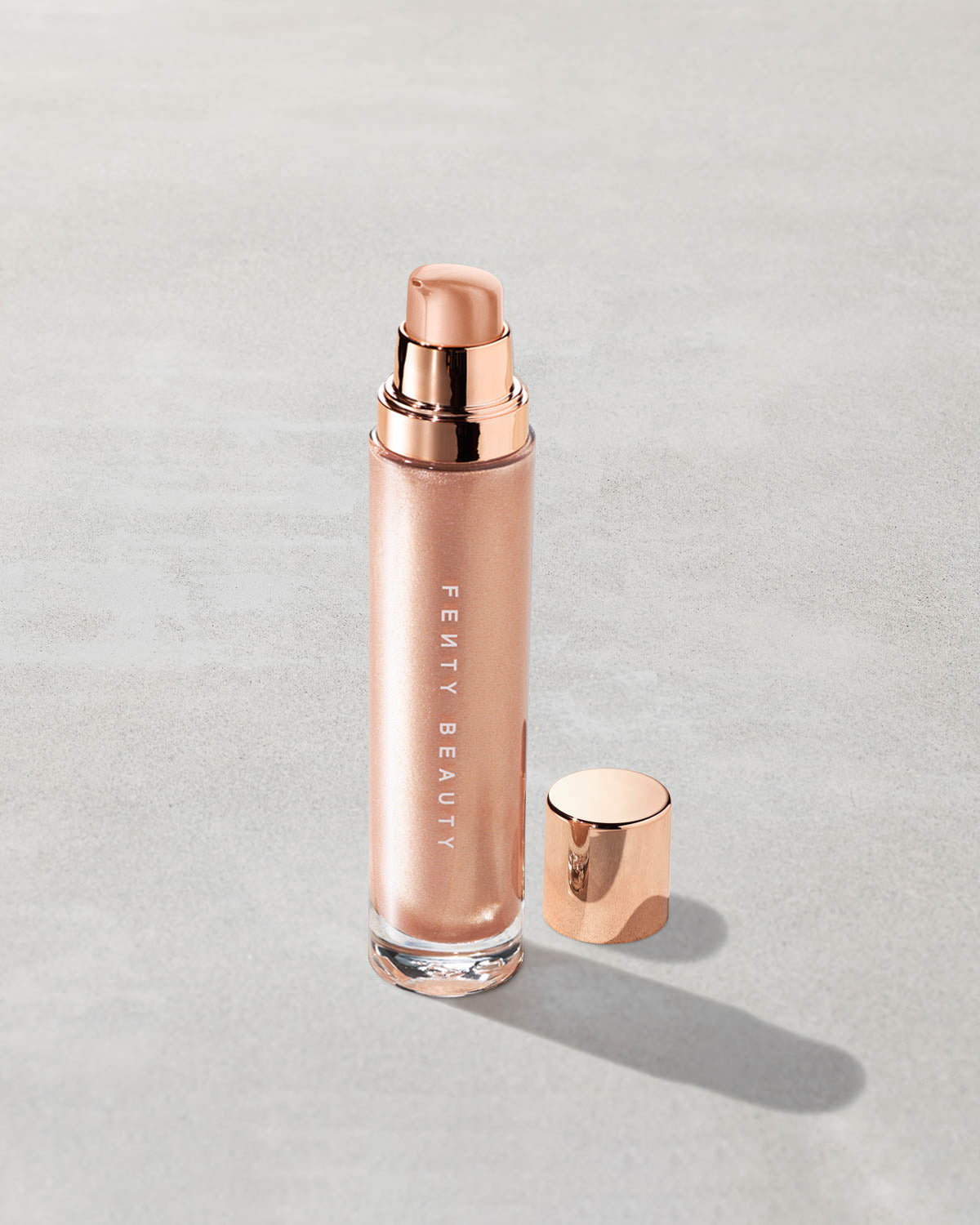 Open product shot of Body Lava Body Luminizer in shade 'Who Needs Clothes'.