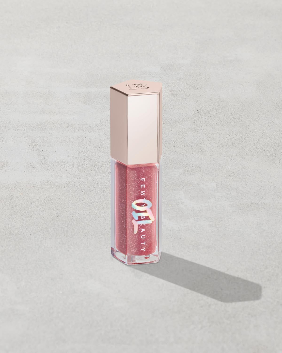 Gloss Bomb Oil Luminizing Lip Oil N' Gloss—Fu$$y
