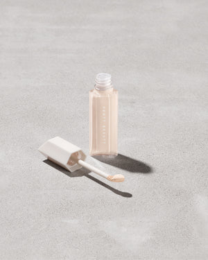 Open We're Even Concealer in shade 100 with doe foot applicator next to it