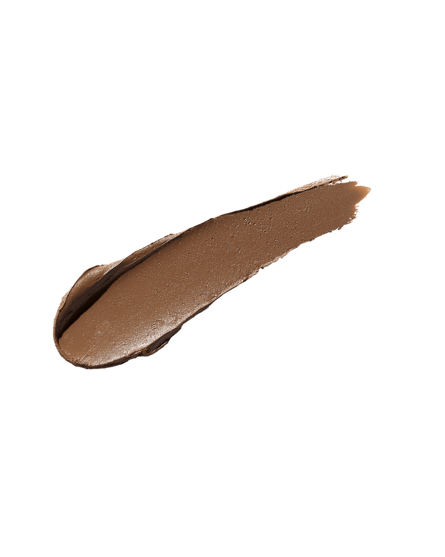 A smear of Match Stix Contour Skinstick in the shade Suedish on a white background.