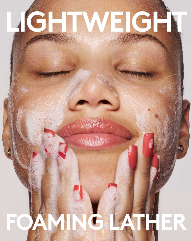 Model washing their face with Cherry Dub Gel Cleanser. Copy reads lightweight, foaming lather.