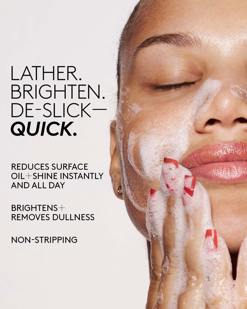 Model washing their face with Cherry Dub Gel Cleanser. Copy reads lather. brighten. de-slick quick. reduces surface oil  shine instantly and all date, brightens + removed dullness, non stripping.